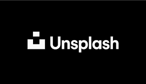 Unsplash logo in white text with a geometric icon on a black background.